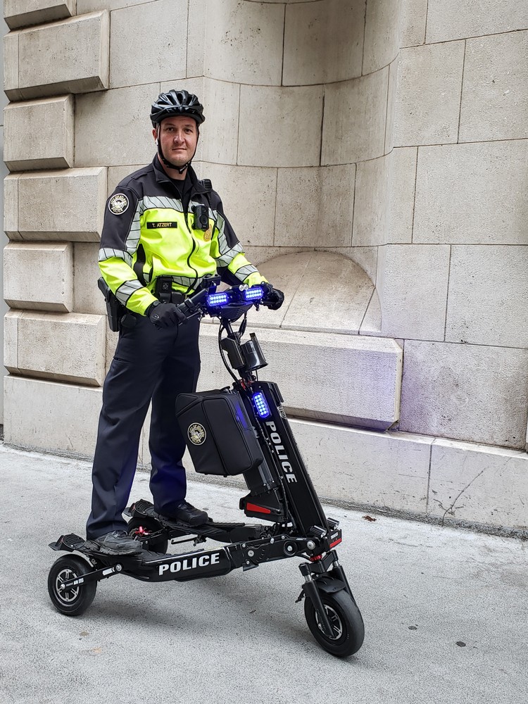 Officer on electric Trikke