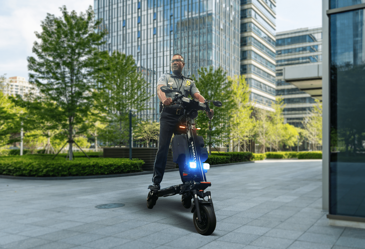 Security Guard patrolling on a Trike security scooter