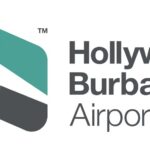 Hollywood Burbank Airport Logo-001 1 Hollywood Burbank Airport logo with teal and charcoal abstract wing symbol beside the text 'Hollywood Burbank Airport'