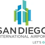SAN DIEGO INTERNATIONAL AIRPORT San Diego International Airport logo with colorful towers and a white plane silhouette, plus the text 'SAN DIEGO INTERNATIONAL AIRPORT' and 'LET'S GO'.