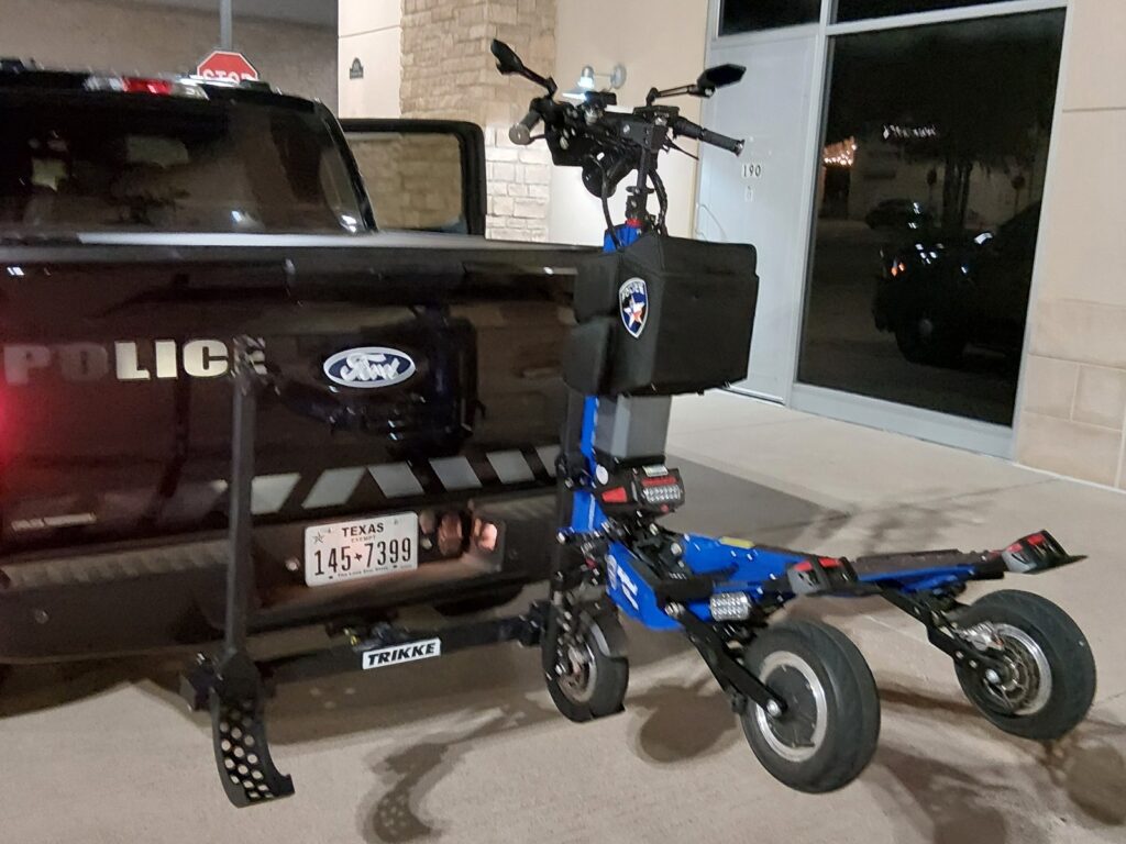 Highland Village PD truck with a Trikke loaded on the Trikke patrol rack.